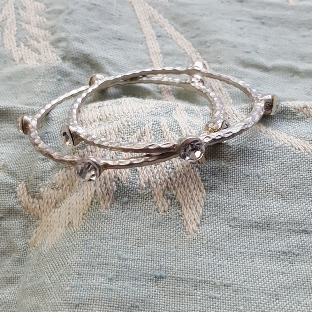 2 hammered silver costume bangles with clear gems